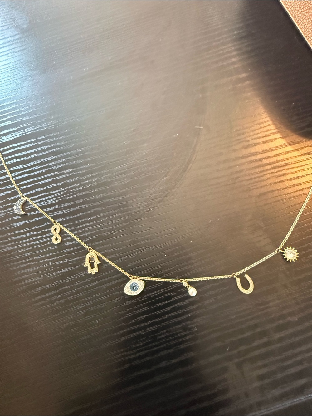 Swarovski Gold Charm Station Necklace with Evil Eye and Symbols